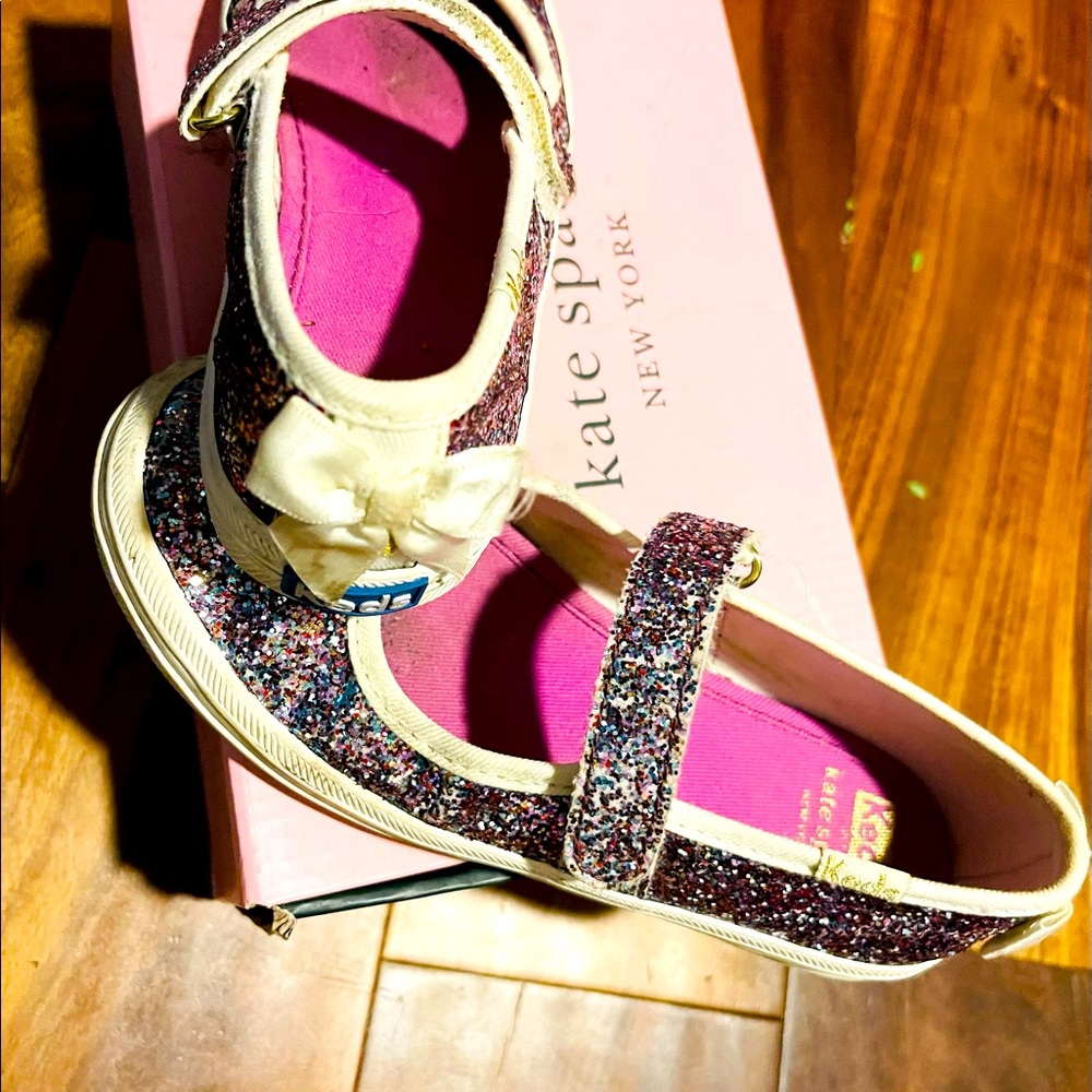 Kate spade for keds. I’m great condition my little girl outgrew them quickly!
